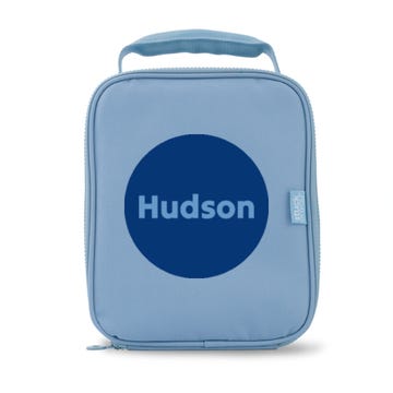 lunch box cooler bag in dusky blue colour with navy circle print personalised with the name Hudson